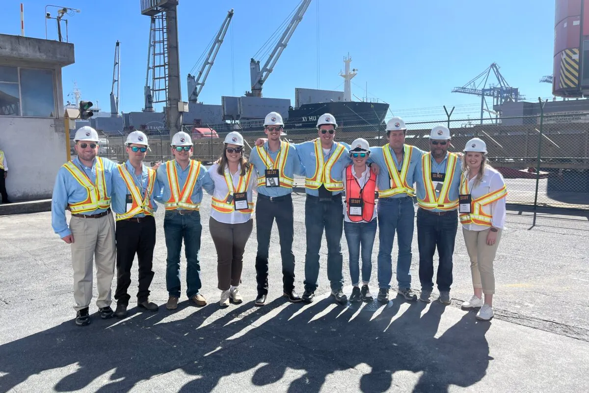 Ten U.S. soybean farmers pose at Guatemala’s Terminal de Granos del Pacífico during the See for Yourself mission.