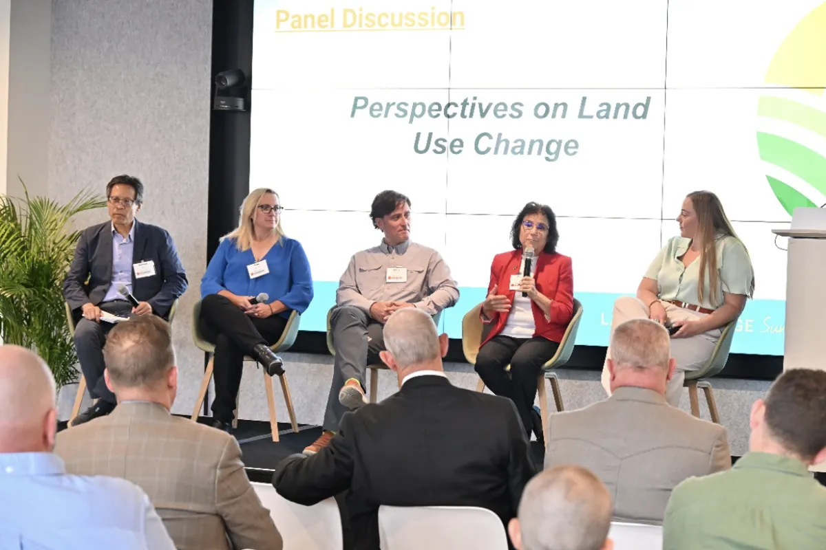 Panelists participate in a discussion on land use change and protecting natural resources.