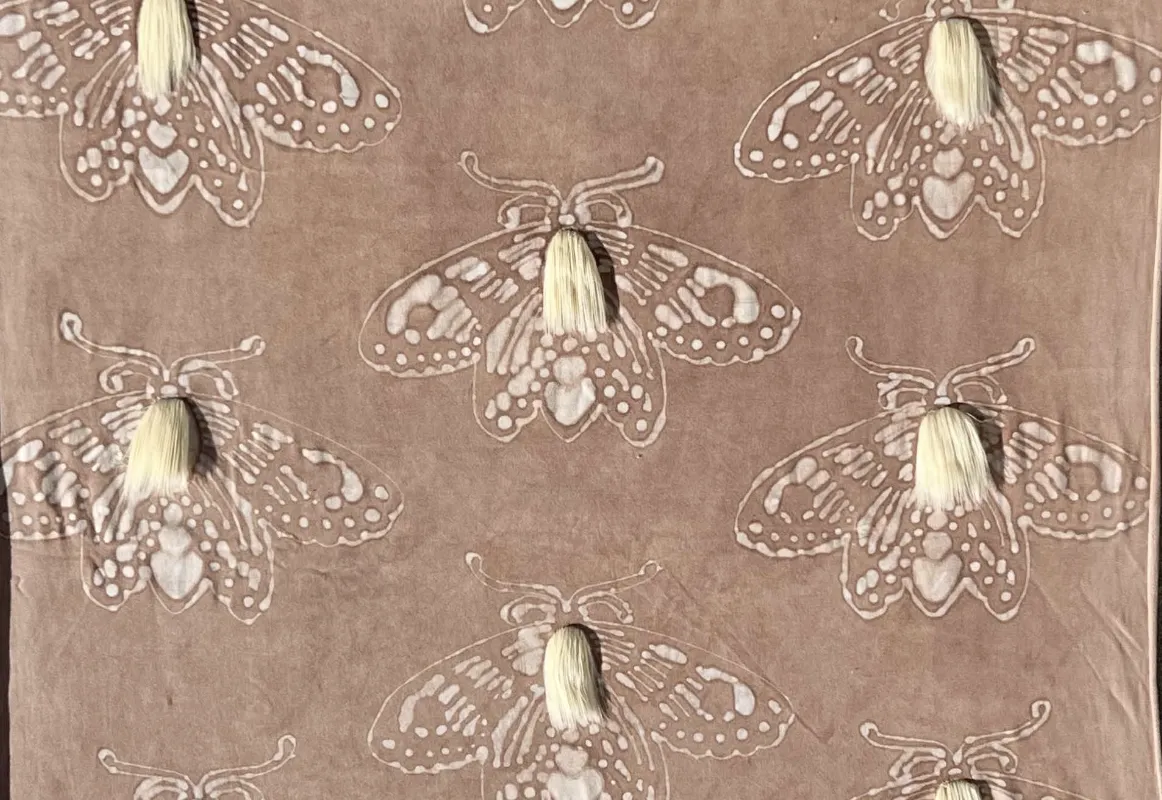 Moth-patterned textile created by NEXTILE design challenge winner Kasandra Wright using soy-based materials.
