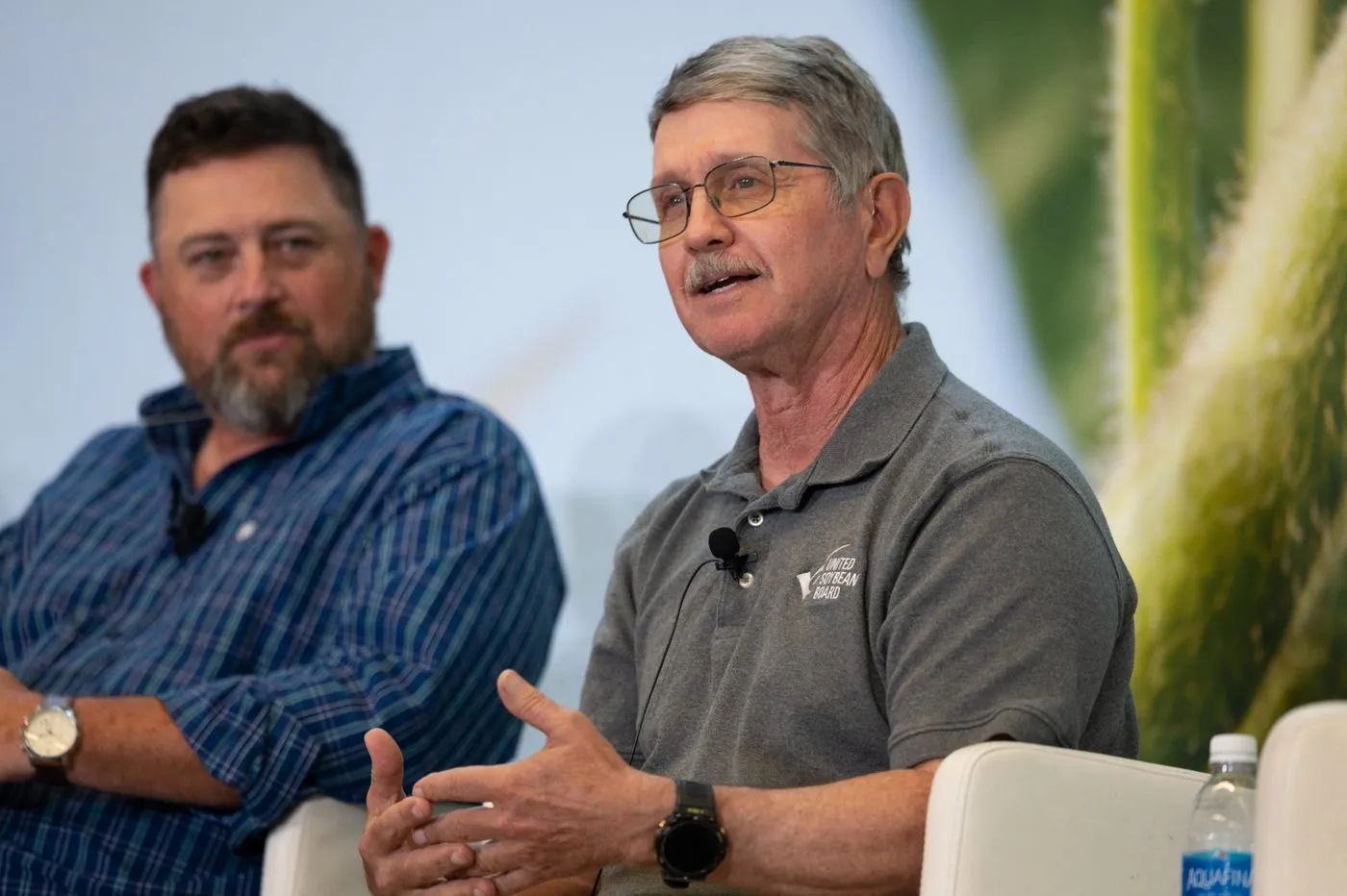 Brent Rendel speaks during a panel discussion on U.S. soybean farming and industry topics.