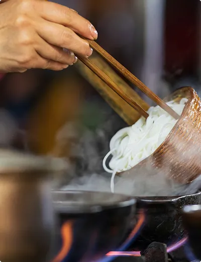 Using chopsticks while cooking